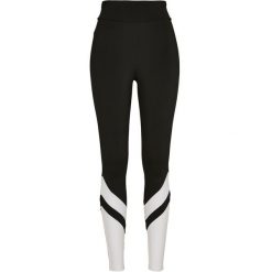Legginsy damskie Urban Classics arrow high waist (grandes tailles). Białe legginsy sportowe Urban Classics, bez wzorów, z podwyższonym stanem. Za 171.50 zł.