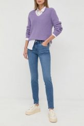 Wrangler jeansy Snuggle Bug damskie medium waist. Niebieskie jeansy Wrangler, bez wzorów, z denimu. Za 379.99 zł.