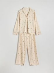 Dwuczęściowa piżama z nadrukiem - kremowy. Białe piżamy Reserved, l, bez wzorów, z bawełny, bez kołnierzyka, bez ramiączek. W wyprzedaży za 99.99 zł.