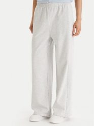 Tommy Hilfiger Spodnie dresowe UW0UW06180 Szary Wide Leg. Szare spodnie dresowe Tommy Hilfiger, bez wzorów, z bawełny. Za 289.99 zł.