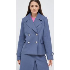 Tommy Hilfiger kurtka z domieszką wełny przejściowa oversize. Niebieskie kurtki Tommy Hilfiger, bez wzorów, z poliesteru, bez kaptura. W wyprzedaży za 919.99 zł.