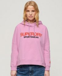 Luźna bluza z kapturem z logo odzieży sportowej. Niebieskia bluzy z kapturem Superdry, bez wzorów, z bawełny, z kapturem, na fitness i siłownię. Za 291.55 zł.