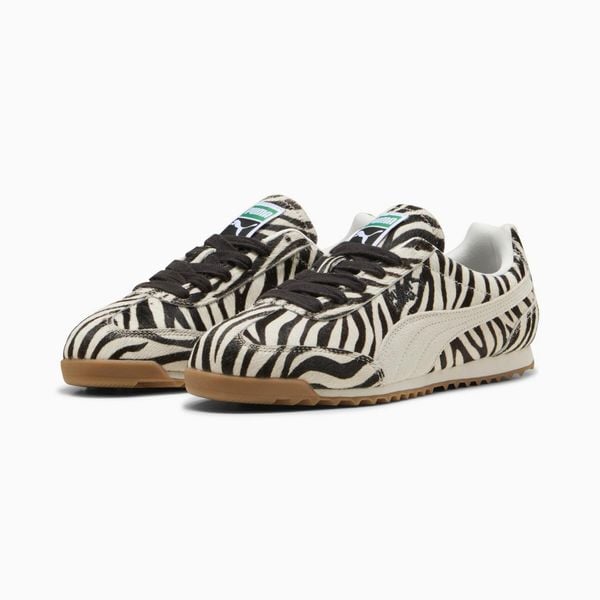 Puma Buty Arizona Zebra 40439801. Brązowe buty treningowe Puma, bez wzorów, z gumy, bez zapięcia. Za 335.06 zł.
