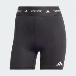 Krótkie legginsy TECHFIT. Czarne legginsy adidas, bez wzorów, z elastanu, krótkie. Za 119.00 zł.