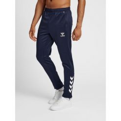 Kombinezon do biegania z poliestru Hummel Core XK. Niebieskie kombinezony Hummel, xl, bez wzorów, eleganckie, bez kołnierzyka, bez ramiączek. W wyprzedaży za 165.95 zł.