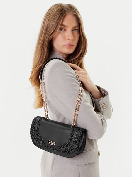 Guess Torebka Tatum HWNG96 67210 Czarny. Czarne kopertówki Guess, z aplikacjami, ze skóry, wizytowe, bez dodatków. Za 329.99 zł.