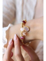 Pierres delicates Pozłacana bransoletka z kwarcem i agatem rozmiar: onesize. Żółte bransoletki Pierres delicates, z agatem, pozłacane. Za 91.99 zł.