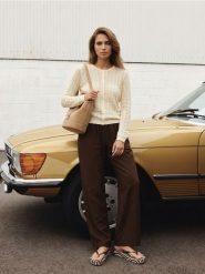 Bawełniany ażurowy kardigan - kremowy. Białe swetry Sinsay, l, w ażurowe wzory, z bawełny, bez ramiączek. Za 49.99 zł.