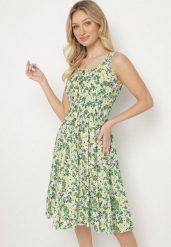 Zielona Bawełniana Sukienka w Kwiatki o Rozkloszowanym Kroju z Guzikami Zirana. Zielone sukienki Born2be, na co dzień, l, bez wzorów, z bawełny, eleganckie, bez kołnierzyka, bez ramiączek, midi, rozkloszowane. Za 39.99 zł.