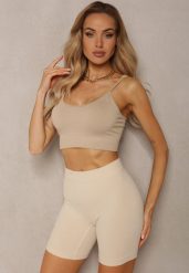Beżowe Elastyczne Szorty Biker o Fasonie Bodycon Marelliam. Brązowe szorty Renee, z aplikacjami, z materiału, sportowe. W wyprzedaży za 27.99 zł.