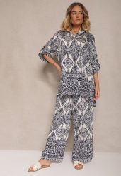 Granatowy Komplet z Wiskozą o Kroju Oversize Koszula i Spodnie Nilarithia. Niebieskie koszule Renee, m, bez wzorów, z materiału, eleganckie, bez kołnierzyka, bez ramiączek. W wyprzedaży za 107.99 zł.