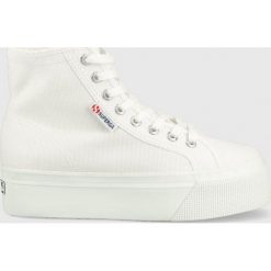 Superga trampki damskie kolor biały. Białe trampki Superga, bez wzorów, z gumy, bez zapięcia. Za 299.99 zł.