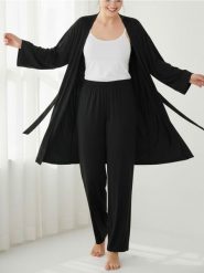 Spodnie piżamowe z szeroką nogawką - czarny. Czarne piżamy Sinsay, l, bez wzorów, bez kołnierzyka, bez ramiączek. Za 29.99 zł.