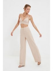 Trendyol Spodnie w kolorze beżowym rozmiar: 38. Brązowe spodnie materiałowe Trendyol, bez wzorów, z materiału, z podwyższonym stanem. Za 110.29 zł.