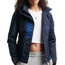 Damska kurtka wodoodporna Superdry Ultimate Windcheater. Niebieskie kurtki Superdry, bez wzorów, bez kaptura. Za 479.10 zł.