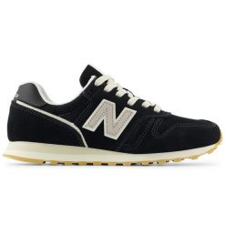 Buty New Balance sneakersy WL373TN2 czarne. Czarne buty treningowe bez wzorów, z materiału, bez zapięcia. Za 451.81 zł.