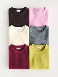 Wełniany sweter - kremowy. Białe swetry Reserved, l, bez wzorów, z wełny, bez ramiączek. Za 139.99 zł.