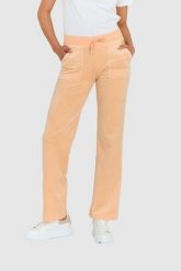 JUICY COUTURE Klasyczne welurowe spodnie dresowe del ray w brzoskwiniowym kolorze. Brązowe spodnie dresowe Juicy Couture, bez wzorów, z dresówki. W wyprzedaży za 299.99 zł.