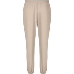 Damskie spodnie dresowe Athlecia Guyana. Brązowe spodnie sportowe Athlecia, bez wzorów, z dresówki, na fitness i siłownię. Za 246.50 zł.