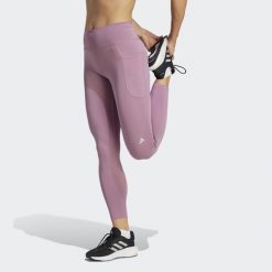 Legginsy DailyRun 7/8. Zielone legginsy adidas, bez wzorów, sportowe. Za 299.00 zł.