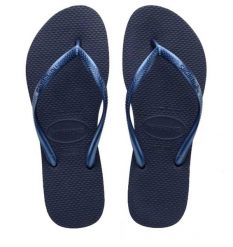 Klapki Havaianas Model 4000030 Kolor Niebieski. Niebieskie klapki Havaianas, bez wzorów, z gumy, sportowe, bez obcasa, bez zapięcia. Za 94.99 zł.