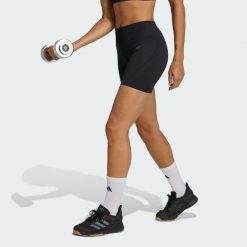Legginsy z dzianiny o długości 4 cali Workout Essentials. Czarne legginsy adidas, bez wzorów, z dzianiny, sportowe. Za 129.00 zł.