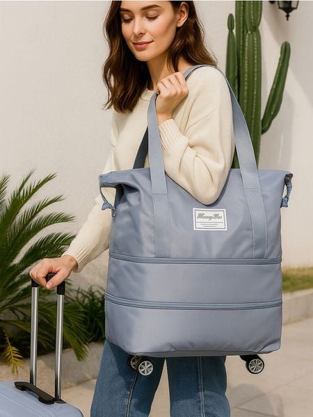 Torba podróżna - błękitny. Niebieskie torby podróżne Sinsay, bez wzorów. Za 49.99 zł.