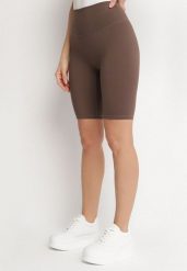 Brązowe Szorty Typu Kolarki z Wysokim Stanem Asallie. Brązowe szorty Born2be, z aplikacjami, sportowe. W wyprzedaży za 33.99 zł.