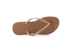 Klapki Havaianas Model 4145651 Kolor Rose. Brązowe klapki Havaianas, bez wzorów, z gumy, eleganckie, bez obcasa, bez zapięcia. Za 94.99 zł.
