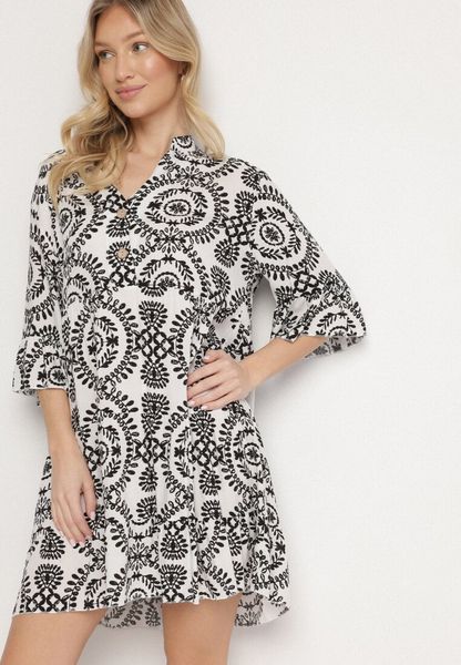 Biało-Czarna Bawełniana Sukienka Rozkloszowana z Guzikami Janisse. Czarne sukienki Born2be, na co dzień, m, bez wzorów, z bawełny, eleganckie, bez kołnierzyka, bez ramiączek, mini, proste. Za 49.99 zł.