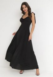 Czarna Rozkloszowana Sukienka Maxi z Wiązanymi Ramiączkami Lisija. Czarne sukienki Born2be, m, bez wzorów, eleganckie, bez kołnierzyka, bez ramiączek, maxi, rozkloszowane. W wyprzedaży za 127.49 zł.