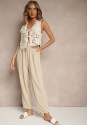 Beżowe Spodnieo Luźnym Fasonie ze Sznurkiem i Gumką w Talii Enivea. Brązowe jeansy Renee, bez wzorów, z jeansu, eleganckie. W wyprzedaży za 35.99 zł.