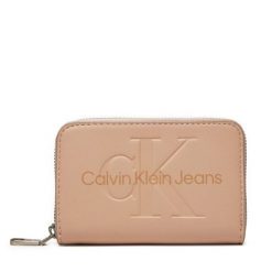 Portfel Calvin Klein Jeans. Portfele Calvin Klein Jeans, bez wzorów, z jeansu. Za 129.99 zł.