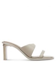 Calvin Klein Klapki Heel Slide 70 Lth HW0HW02072 Beżowy. Brązowe klapki Calvin Klein, bez wzorów, ze skóry, bez obcasa, bez zapięcia. Za 559.99 zł.