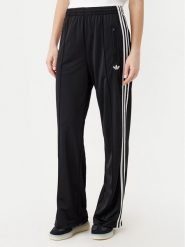 Adidas Spodnie dresowe adicolor Classic Firebird JC8245 Czarny Loose Fit. Czarne spodnie dresowe adidas, bez wzorów, z dresówki. Za 259.99 zł.