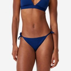 Dół kostiumu kąpielowego damski Decathlon Sandy Zuma. Niebieskie bikini OLAIAN, bez wzorów, z elastanu, eleganckie. Za 39.99 zł.