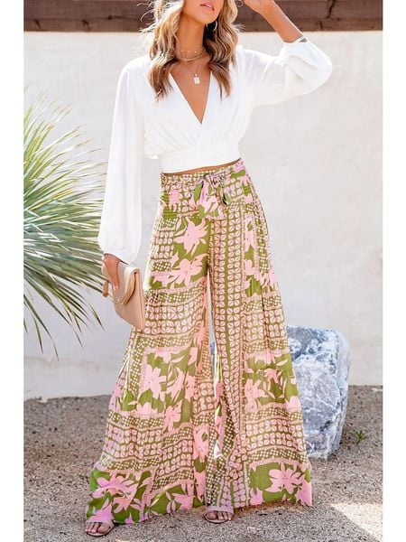 Milan Kiss Spodnie w kolorze oliwkowo-jasnoróżowym rozmiar: XL. Brązowe spodnie materiałowe Milan Kiss, bez wzorów, z materiału. Za 79.21 zł.