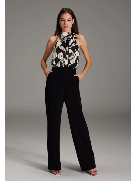 SWING Kombinezon w kolorze czarnym rozmiar: 38. Czarne kombinezony Swing, bez wzorów, bez kołnierzyka, bez ramiączek. Za 284.15 zł.