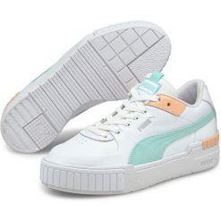 Buty do chodzenia damskie Puma Cali Sport. Białe buty treningowe Puma, bez wzorów, z materiału, bez zapięcia, trekkingowe. Za 395.00 zł.