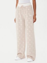 Guess Spodnie dresowe V5BB00 K1902 Brązowy Wide Leg. Brązowe spodnie dresowe Guess, z aplikacjami, z dresówki. Za 279.99 zł.