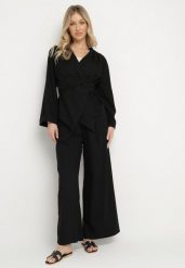 Czarny Komplet z Lnem Kopertowa Bluzka i Spodnie Koririssa. Czarne bluzki Born2be, m, bez wzorów, z materiału, eleganckie, bez kołnierzyka, bez ramiączek. Za 229.99 zł.