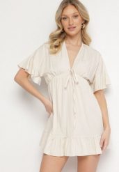 Beżowa Nietoperzowa Sukienka z Wiskozą o Rozkloszowanym Kroju z Falbanką Tullimi. Brązowe sukienki Born2be, na co dzień, uniwersalny, bez wzorów, z wiskozy, eleganckie, bez kołnierzyka, bez ramiączek, mini, kopertowe. Za 69.99 zł.