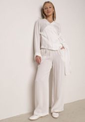 Białe Wiskozowe Spodnie z Szeroką Nogawką i Wiązaniem w Talii Terisanna. Białe jeansy Born2be, l, bez wzorów, z jeansu, eleganckie. Za 119.99 zł.