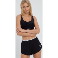 Juicy Couture szorty piżamowe damskie kolor czarny. Czarne piżamy Juicy Couture, l, bez wzorów, z dzianiny, bez kołnierzyka, bez ramiączek. W wyprzedaży za 129.99 zł.