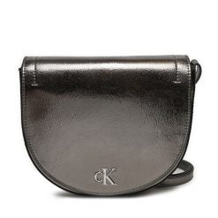 Torebka Calvin Klein Jeans. Żółte listonoszki Calvin Klein Jeans, bez wzorów, z jeansu, bez dodatków. Za 319.99 zł.