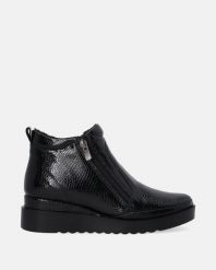 LAKIEROWANE BOTKI NA KOTURNIE B009CRBLOBB043. Botki Venezia, bez wzorów, z lakierowanej skóry, bez obcasa, na koturnie, bez zapięcia. Za 449.00 zł.