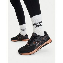 Buty na siłownię Reebok. Czarne buty treningowe Reebok, bez wzorów, bez zapięcia, na fitness i siłownię. Za 599.99 zł.