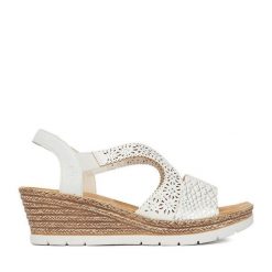 Sandały Rieker. Białe sandały Rieker, bez wzorów, bez obcasa, na koturnie, bez zapięcia. Za 319.99 zł.