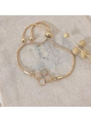 Atelier MIU Pozłacana bransoletka z elementem ozdobnym - dł. 20 cm rozmiar: onesize. Białe bransoletki atelier MIU, z cyrkonią, pozłacane. Za 39.99 zł.