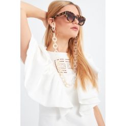 Łańcuszek do okularów EMMANUELLE KHANH. Żółte okulary przeciwsłoneczne Emmanuelle Khanh, bez wzorów, metalowe. Za 779.00 zł.